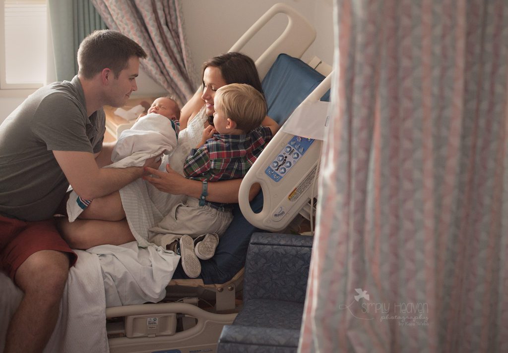 family meeting a new baby in the hospital